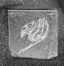 Load image into Gallery viewer, A clear square glass coaster etched with a tribal tattoo style Fairy Tail guild logo. 
