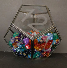 Load image into Gallery viewer, The large D12 terrarium less than half-full of dice in an array of colors. There are 222 dice in the terrarium.
