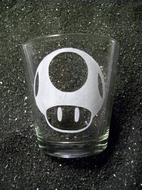 Extra extra large shot glass etched with a 1UP mushroom design. 