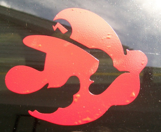 Red car decal of a stylized Mario's face. 