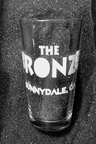 Pint glass etched with the words 